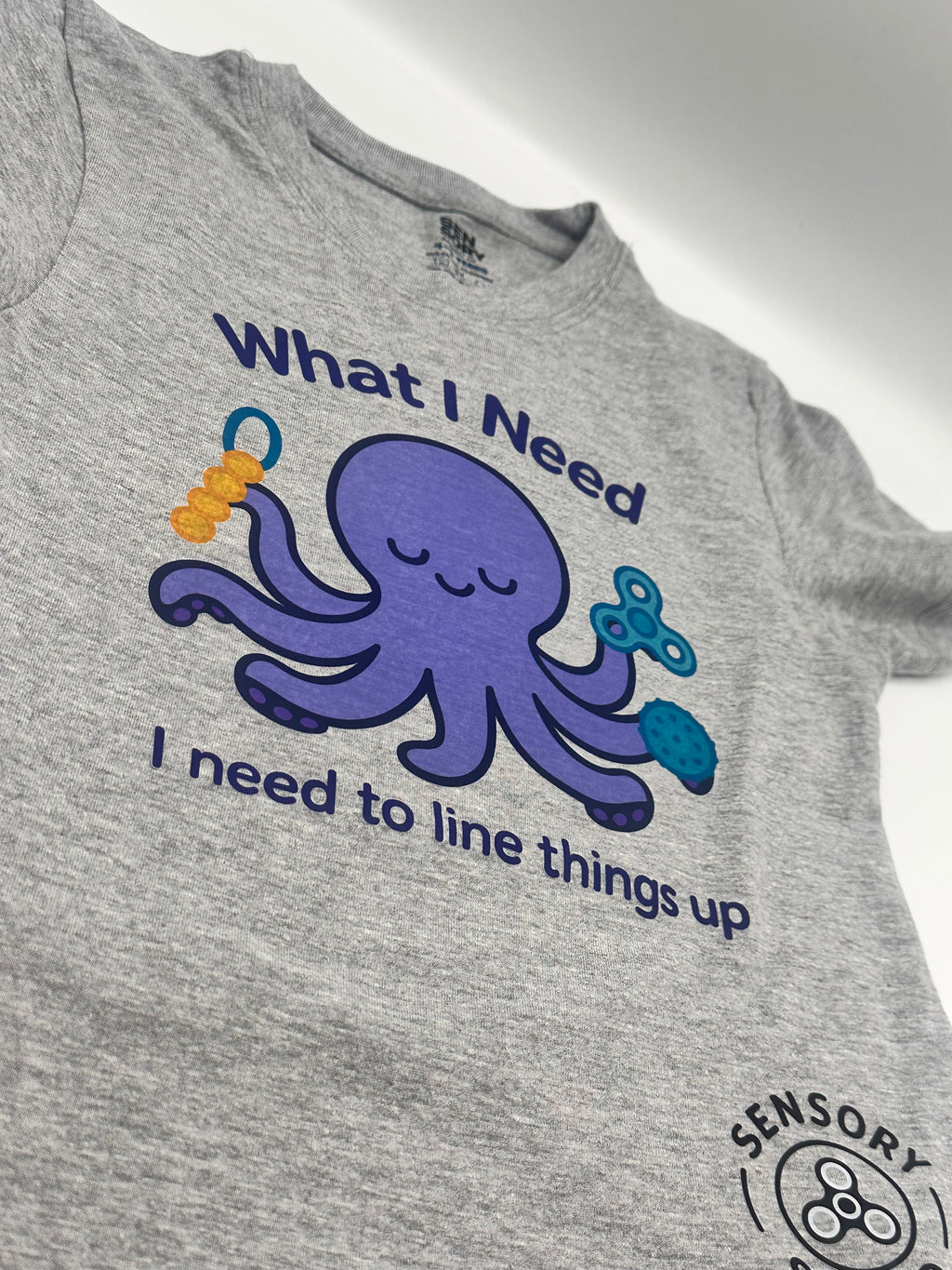 “What I Need Is to Line Things Up” – Sensory Squad T-Shirt (Featuring Ocho the Octopus)